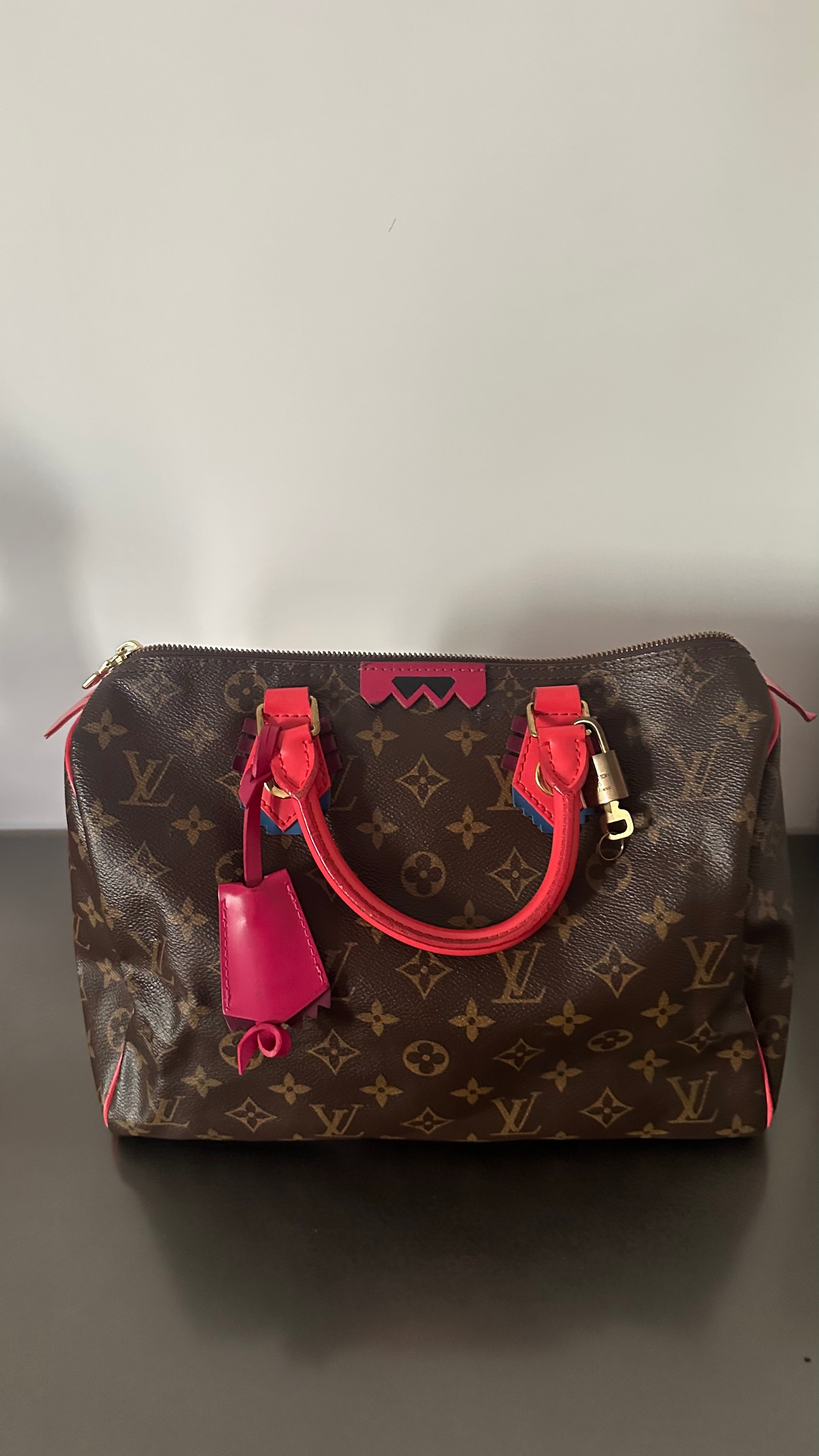 Louis Vuitton Monogram Totem Speedy 30 in the limited-edition "Flamingo"