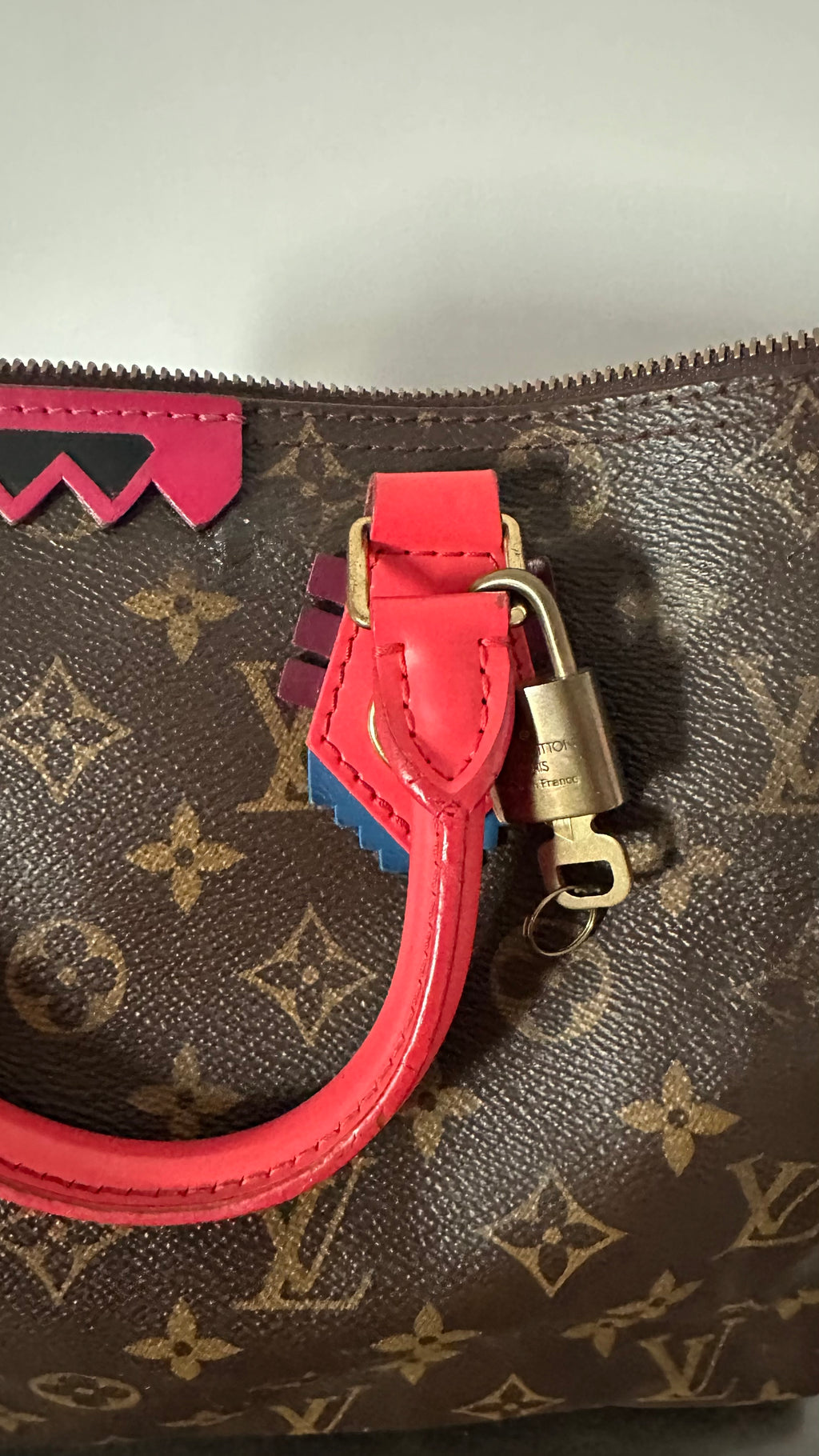 Louis Vuitton Monogram Totem Speedy 30 in the limited-edition "Flamingo"